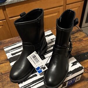 DV by Dolce Vita women's moto boots with harness strap detailing.